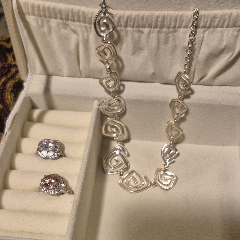 Elegant Silver Tone Swirl Necklace and Ring Set